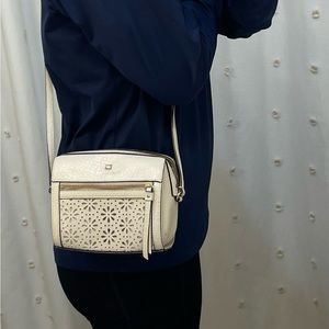 Kate Spade, used once, crossbody purse in a cream color. Gorgeous!